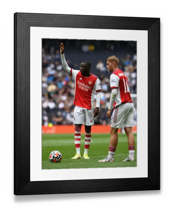 Framed Print : Tottenham vs Arsenal: The Mind Series Showdown - Pepe and Smith Rowe in Action