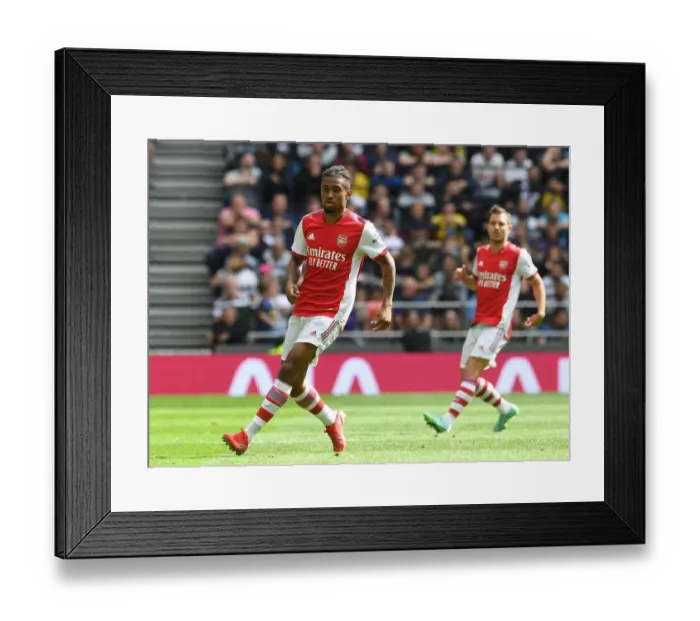 Framed Print : Battle for London: Reiss Nelson in Action - Tottenham Hotspur vs. Arsenal (2021-22)