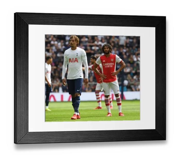Framed Print : Mohamed Elneny's Unwavering Concentration: Arsenal vs. Tottenham Hotspur in The MIND Series 2021-22