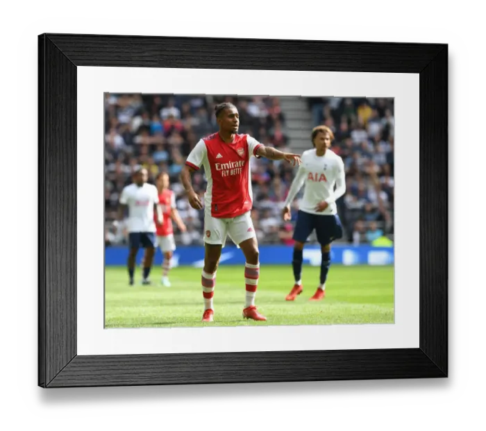 Framed Print : Reiss Nelson's Determination: Arsenal's Premier League Triumph over Tottenham Hotspur Framed Print : Reiss Nelson's Determination: Arsenal's Premier League Triumph over Tottenham Hotspur