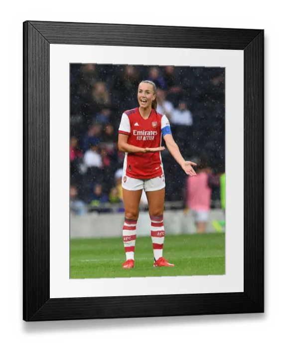 Framed Print : Arsenal's Lia Walti Goes Head-to-Head with Tottenham Hotspur in Intense Women's Football Showdown