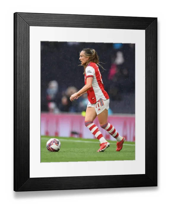 Framed Print : Arsenal's Lisa Evans Goes Head-to-Head Against Tottenham Hotspur in MIND Series Showdown