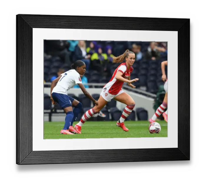 Framed Print : Arsenal's Lia Walti Faces Off Against Tottenham Hotspur in Intense Women's Football Showdown
