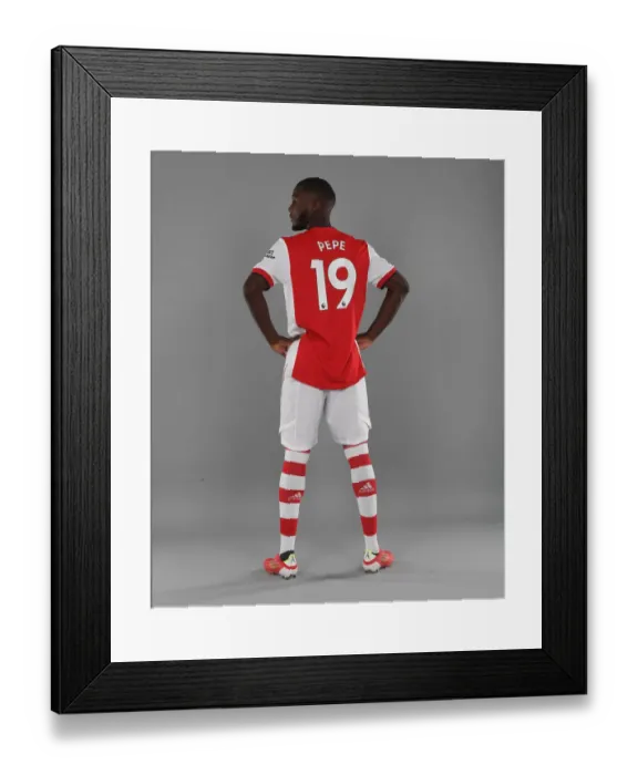 Framed Print : Nicolas Pepe Kicks Off Arsenal's 2021-22 Season at London Colney Training Ground Framed Print : Nicolas Pepe Kicks Off Arsenal's 2021-22 Season at London Colney Training Ground
