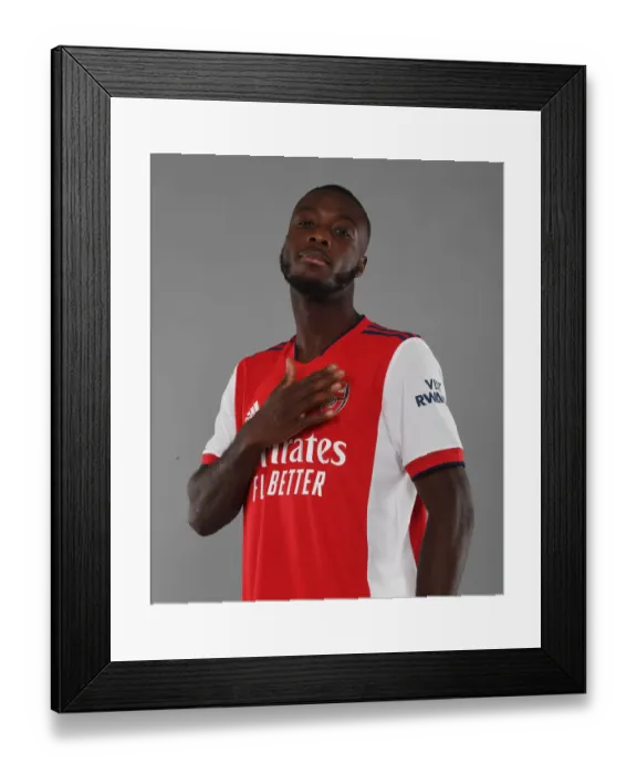Framed Print : Arsenal's Nicolas Pepe Kicks Off New Season Training at London Colney