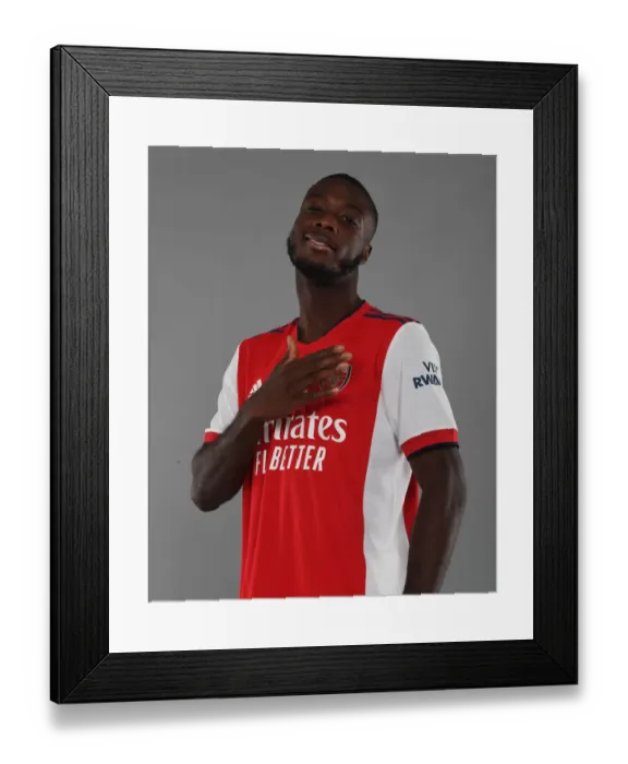 Framed Print : Arsenal's Nicolas Pepe Begins New Season Training at London Colney Framed Print : Arsenal's Nicolas Pepe Begins New Season Training at London Colney