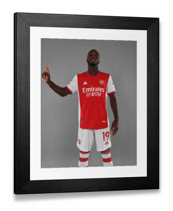 Framed Print : Nicolas Pepe Kicks Off Arsenal's 2021-22 Season at London Colney Framed Print : Nicolas Pepe Kicks Off Arsenal's 2021-22 Season at London Colney