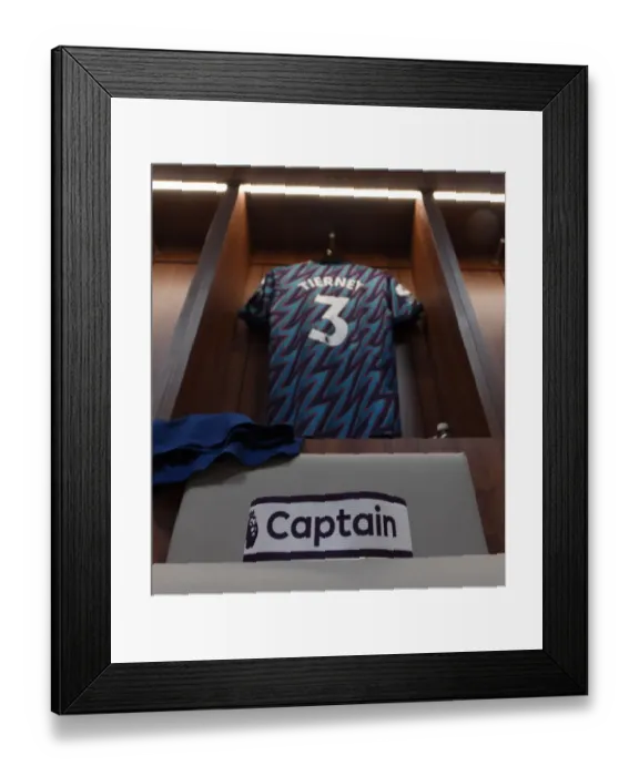 Framed Print : Arsenal's Kieran Tierney Prepares for Brentford Clash in Premier League
