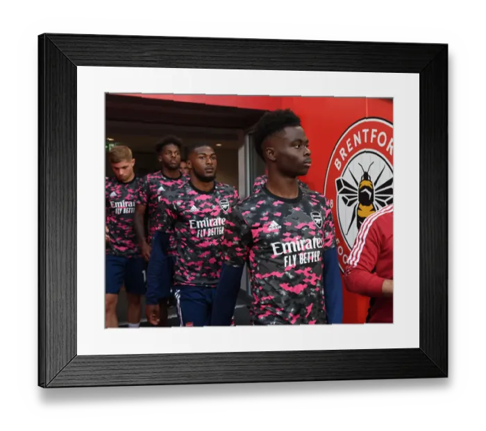 Framed Print : Bukayo Saka Gears Up: Brentford vs Arsenal, 2021-22 Premier League