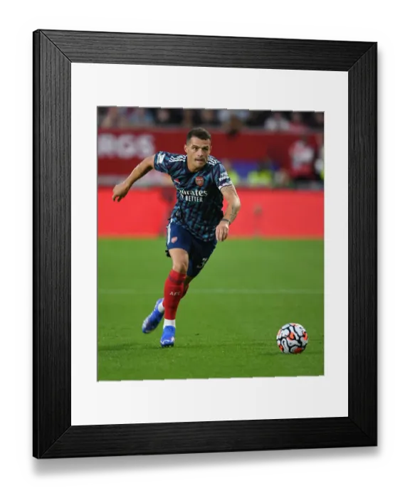 Framed Print : Granit Xhaka: Arsenal's Midfield Maestro Dazzles in Arsenal's Win Against Brentford (2021-22 Premier League)