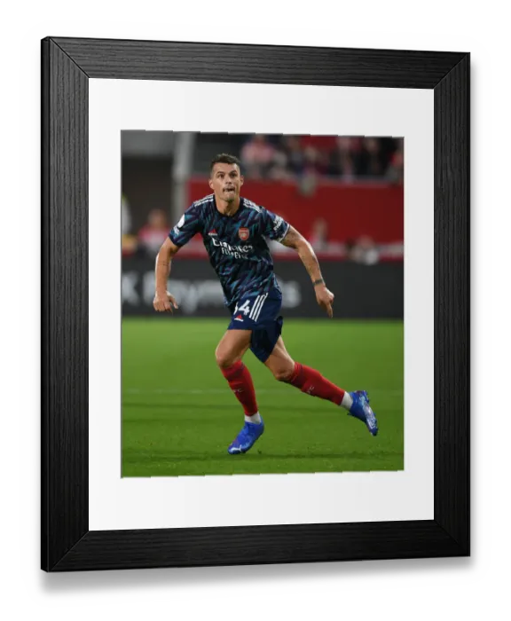 Framed Print : Granit Xhaka: Arsenal's Brilliant Midfield Performance Against Brentford (2021-22 Premier League) Framed Print : Granit Xhaka: Arsenal's Brilliant Midfield Performance Against Brentford (2021-22 Premier League)