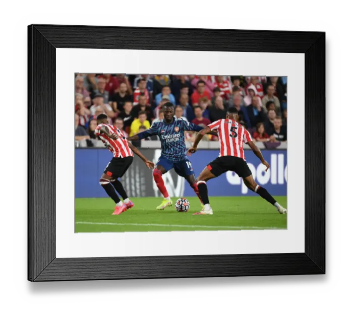 Framed Print : Pepe in Action: Arsenal vs. Brentford, 2021-22 Premier League Framed Print : Pepe in Action: Arsenal vs. Brentford, 2021-22 Premier League