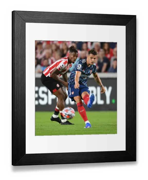 Framed Print : Granit Xhaka: Arsenal's Midfield Maestro Sparks Victory over Brentford, 2021-22 Premier League