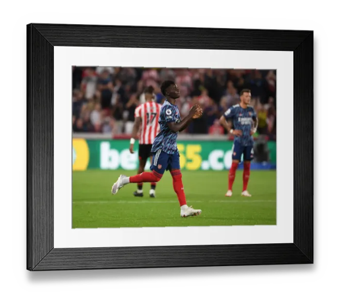 Framed Print : Bukayo Saka's Second-Half Debut: Arsenal's Comeback at Brentford