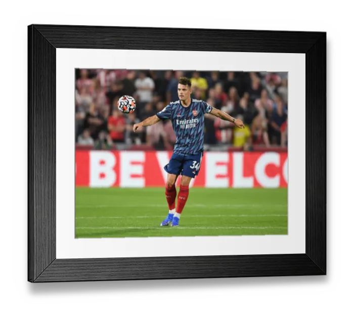 Framed Print : Xhaka in Action: Brentford vs. Arsenal, 2021-22 Premier League Framed Print : Xhaka in Action: Brentford vs. Arsenal, 2021-22 Premier League