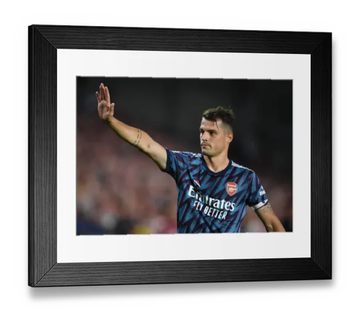 Framed Print : Granit Xhaka in Action: Arsenal's Midfield Maestro Shines Against Brentford in Premier League 2021-22