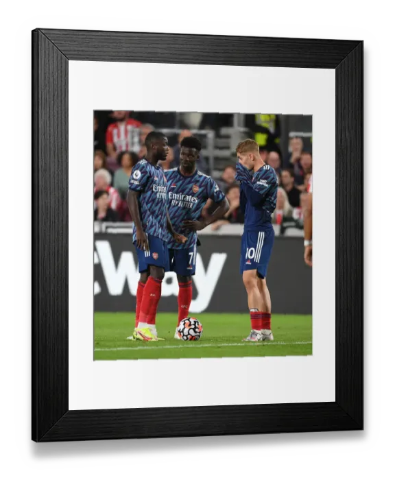 Framed Print : Arsenal's Pepe, Saka, and Smith Rowe in Action against Brentford (2021-22)