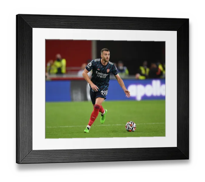 Framed Print : Arsenal's Calum Chambers in Action against Brentford in Premier League Clash (2021-22)