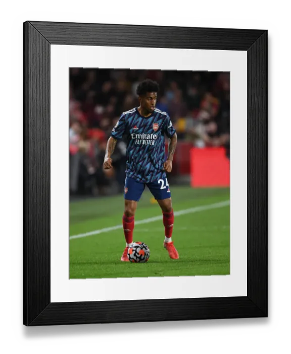 Framed Print : Reiss Nelson in Action: Brentford vs Arsenal, Premier League 2021-22