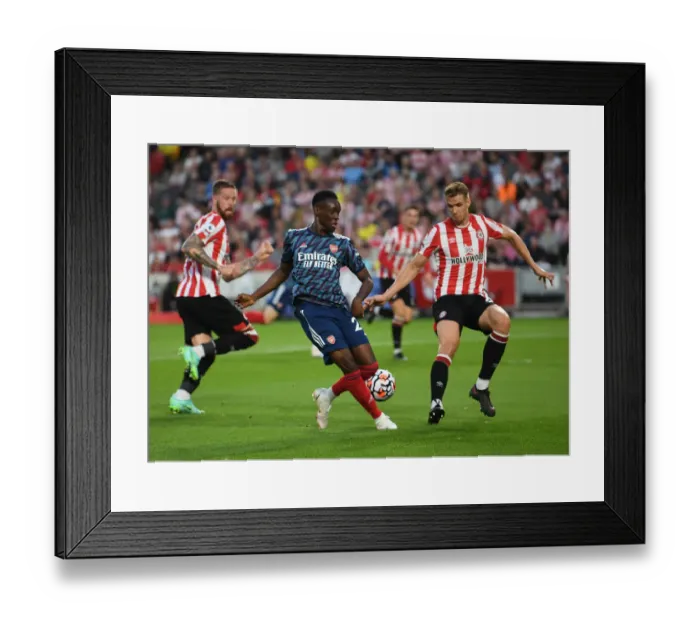 Framed Print : Backheel Battle: Flo Balogun vs. Kristoffer Ajer - A Premier League Showdown