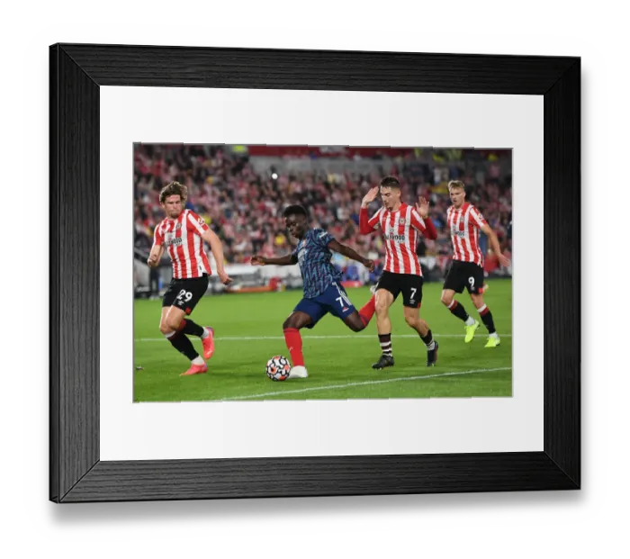Framed Print : Bukayo Saka Shines: Arsenal's Victory Over Brentford in Premier League 2021-22 Framed Print : Bukayo Saka Shines: Arsenal's Victory Over Brentford in Premier League 2021-22
