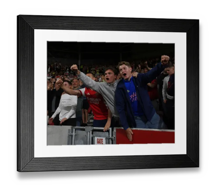 Framed Print : Sea of Red and White: Arsenal Fans at Brentford Community Stadium - Premier League 2021-22