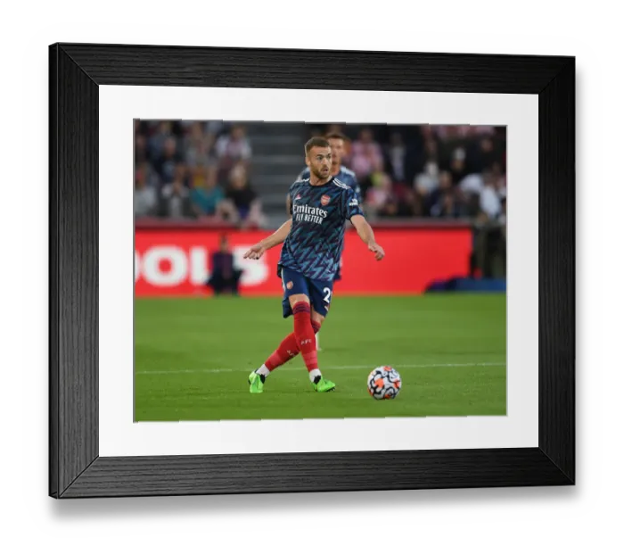 Framed Print : Arsenal's Calum Chambers in Action at Brentford Community Stadium