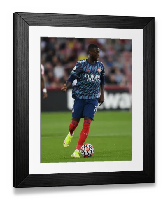 Framed Print : Pepe in Action: Brentford vs Arsenal, 2021-22 Premier League Framed Print : Pepe in Action: Brentford vs Arsenal, 2021-22 Premier League