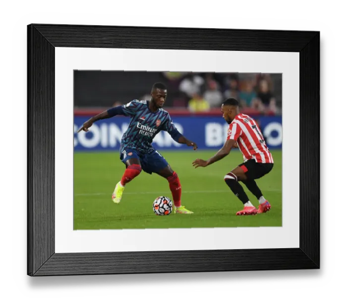 Framed Print : Pepe vs Henry: Brentford vs Arsenal, 2021-22 Premier League Clash Framed Print : Pepe vs Henry: Brentford vs Arsenal, 2021-22 Premier League Clash
