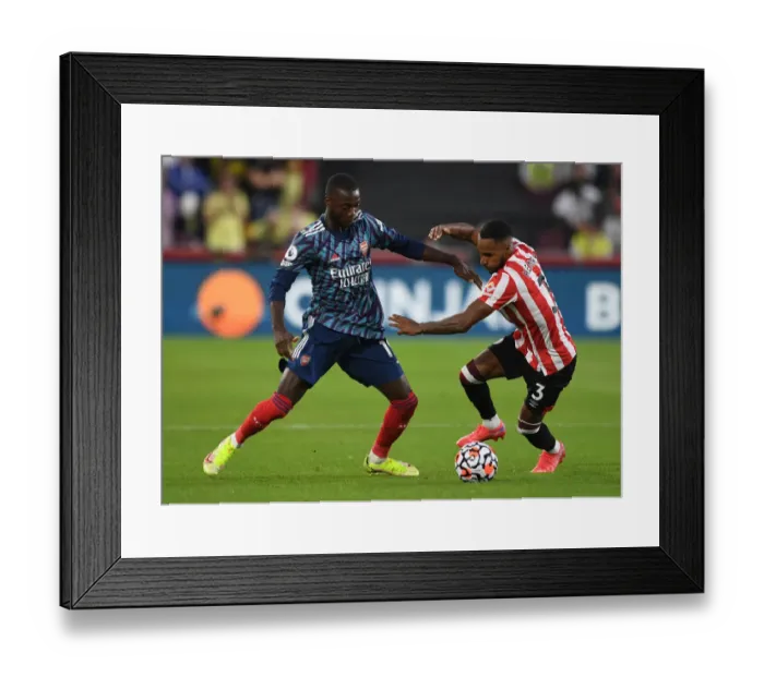 Framed Print : Pepe vs Henry: Battle in the Premier League - Brentford vs Arsenal (2021-22)