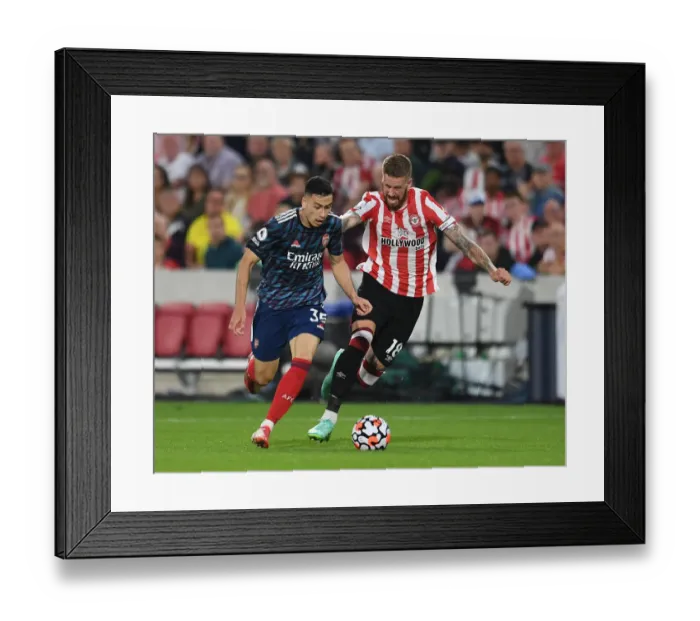 Framed Print : Martinelli vs Jansson: A Premier League Battle at Brentford Community Stadium, 2021-22