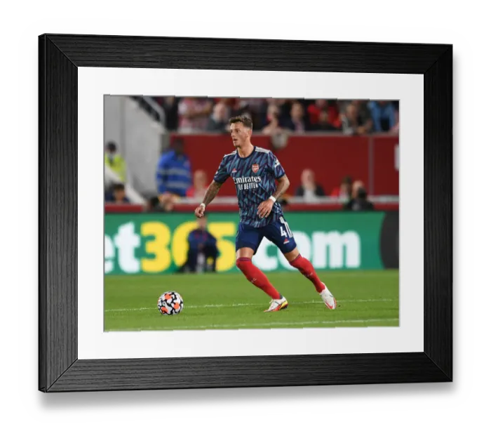 Framed Print : Arsenal's Ben White in Action: Premier League Clash Against Brentford, 2021-22