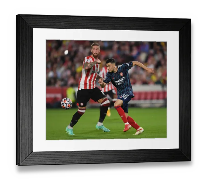 Framed Print : Martinelli vs Jansson: A Premier League Showdown at Brentford Community Stadium, 2021-22 Framed Print : Martinelli vs Jansson: A Premier League Showdown at Brentford Community Stadium, 2021-22
