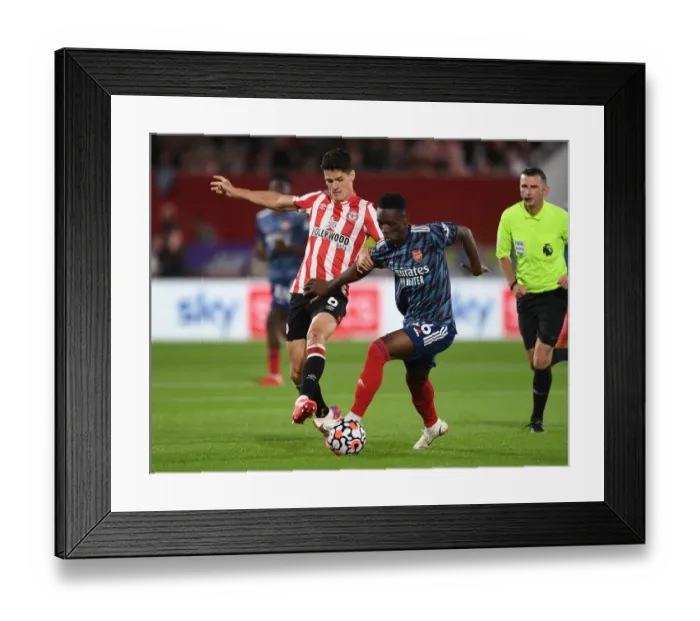 Framed Print : Intense Battle: Flo Balogun vs Christian Norgaard - Premier League Clash between Arsenal and Brentford Framed Print : Intense Battle: Flo Balogun vs Christian Norgaard - Premier League Clash between Arsenal and Brentford