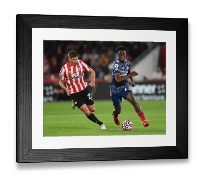 Framed Print : Midfield Battle: Lokonga vs Janelt - Brentford vs Arsenal Premier League Clash (2021-22)
