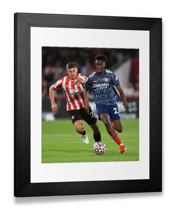 Framed Print : Midfield Battle: Lokonga vs Janelt - Brentford vs Arsenal Premier League Clash (2021-22)
