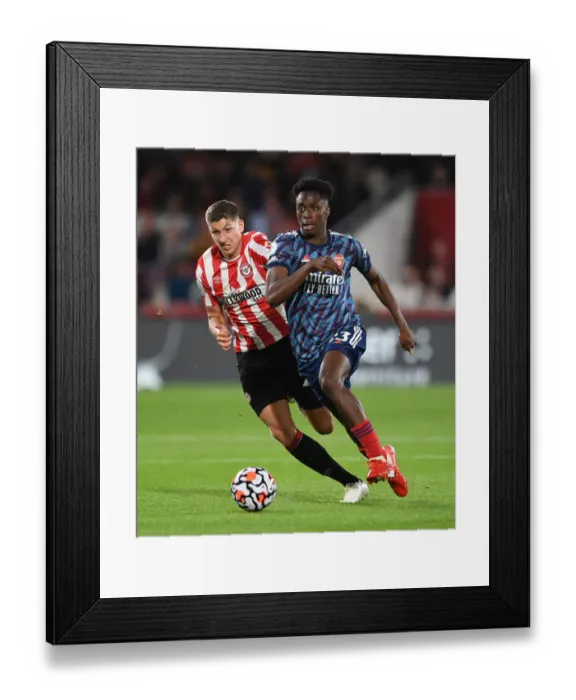 Framed Print : Brentford vs Arsenal: Albert Sambi Lokonga Clashes with Vitaly Janelt in Premier League Showdown Framed Print : Brentford vs Arsenal: Albert Sambi Lokonga Clashes with Vitaly Janelt in Premier League Showdown