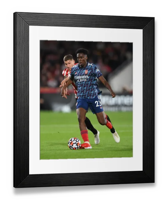 Framed Print : Clash of Midfield Titans: Lokonga vs Janelt - Brentford vs Arsenal Premier League Showdown Framed Print : Clash of Midfield Titans: Lokonga vs Janelt - Brentford vs Arsenal Premier League Showdown