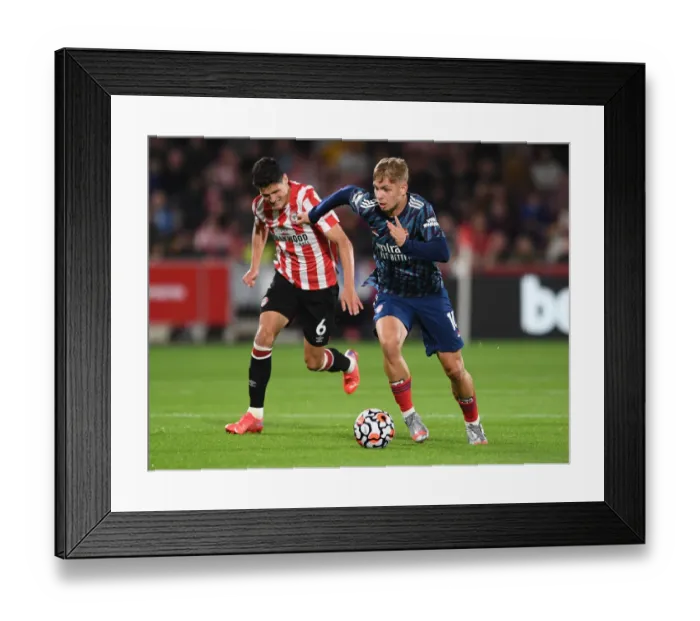 Framed Print : Arsenal's Emile Smith Rowe vs Brentford's Christian Norgaard: A Premier League Showdown - Young Gun vs Midfield Veteran (2021-22) Framed Print : Arsenal's Emile Smith Rowe vs Brentford's Christian Norgaard: A Premier League Showdown - Young Gun vs Midfield Veteran (2021-22)
