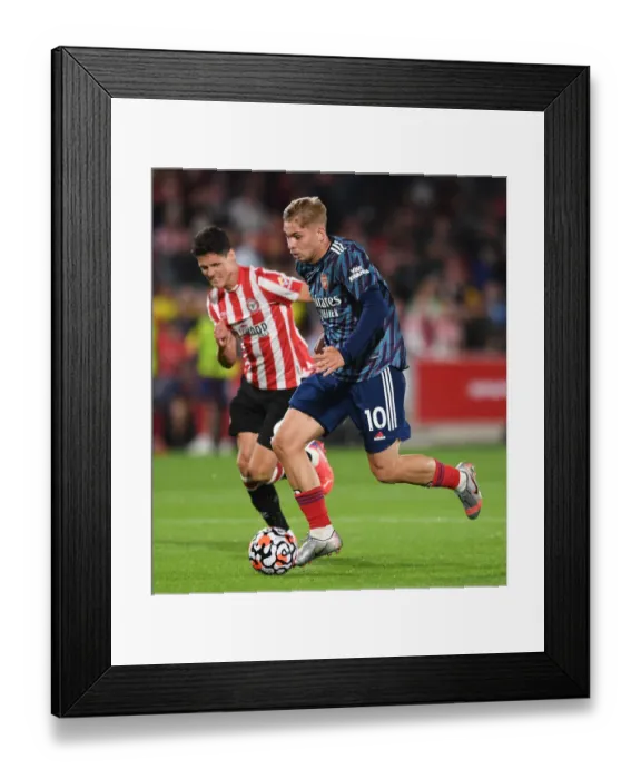 Framed Print : Emile Smith Rowe vs Christian Norgaard: Battle in the Premier League - Brentford vs Arsenal (2021-22) Framed Print : Emile Smith Rowe vs Christian Norgaard: Battle in the Premier League - Brentford vs Arsenal (2021-22)