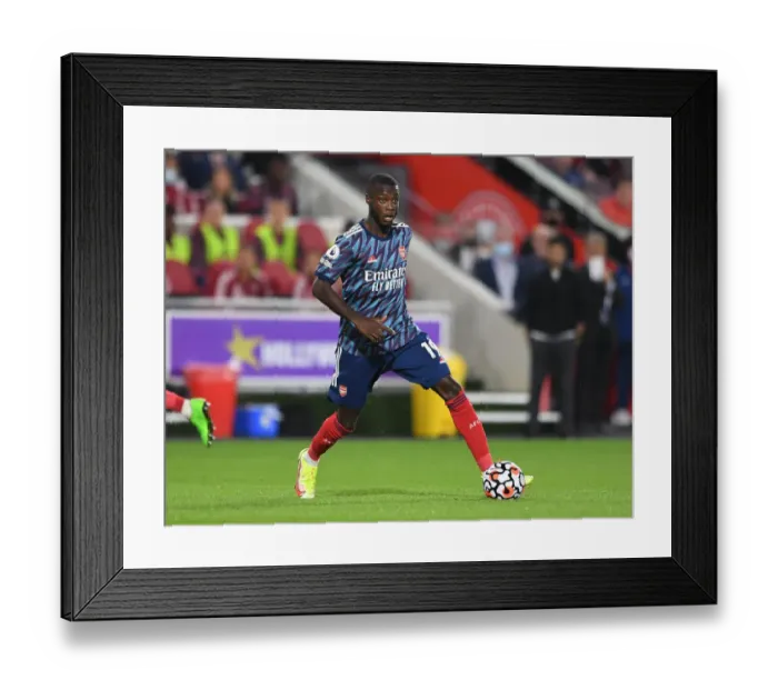 Framed Print : Pepe Leads Arsenal in Premier League Clash against Brentford Framed Print : Pepe Leads Arsenal in Premier League Clash against Brentford