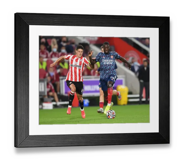 Framed Print : Pepe vs Canos: Battle in the Premier League - Brentford vs Arsenal (2021-22) Framed Print : Pepe vs Canos: Battle in the Premier League - Brentford vs Arsenal (2021-22)