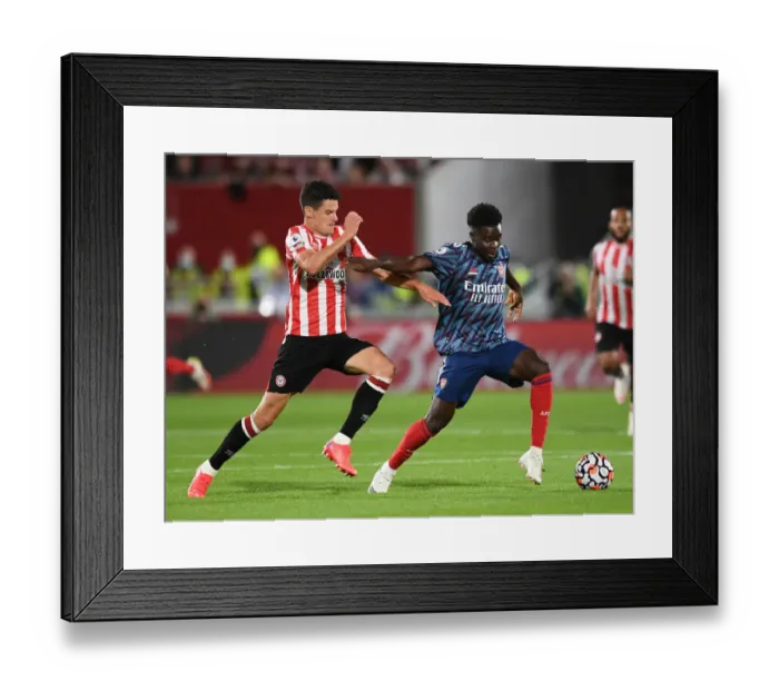Framed Print : Bukayo Saka Shines: Arsenal Secures Victory Against Brentford in Premier League 2021-22