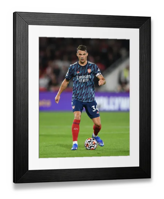 Framed Print : Granit Xhaka: Arsenal's Midfield Maven Dazzles in Arsenal's Victory Over Brentford (2021-22 Premier League)