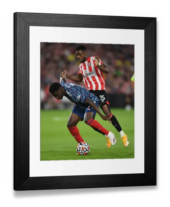 Framed Print : Bukayo Saka Shines: Arsenal's Dominance over Brentford in Premier League 2021-22