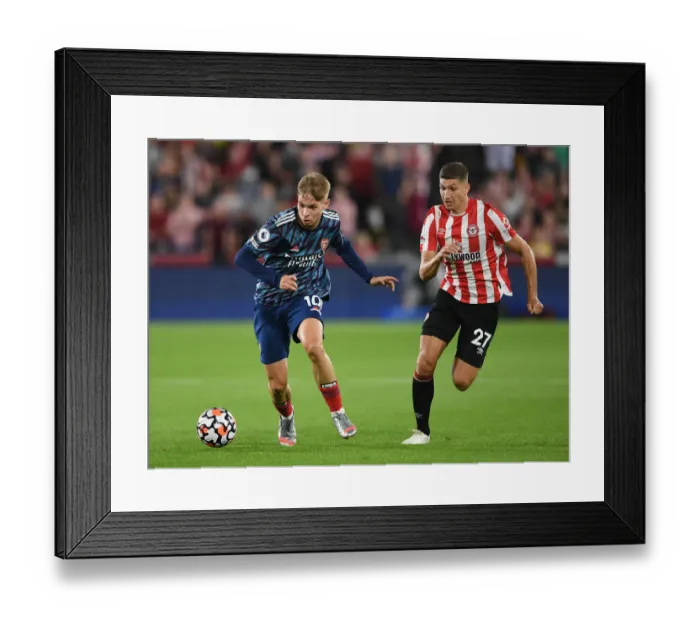 Framed Print : Brentford vs Arsenal: Emile Smith Rowe Clashes with Vitaly Janelt in Premier League Showdown