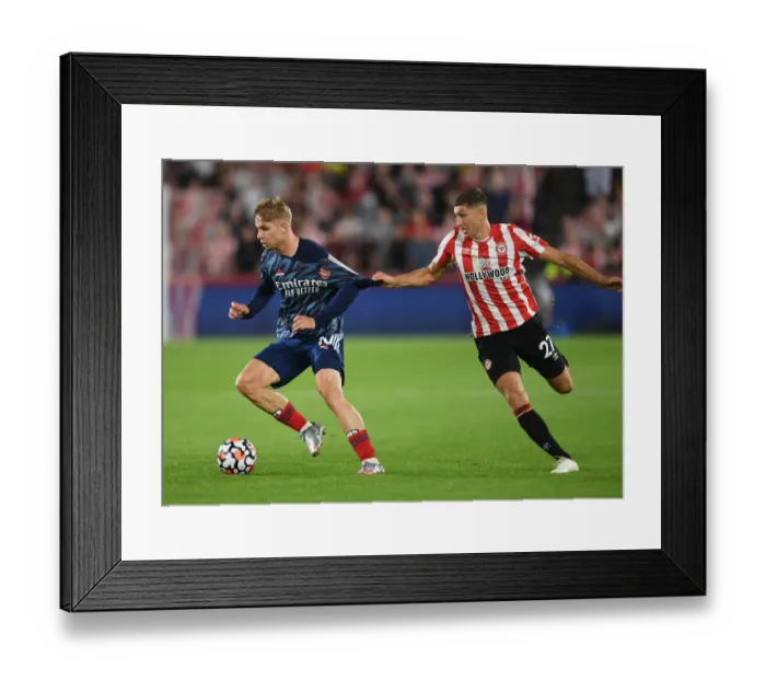 Framed Print : Emile Smith Rowe vs. Vitaly Janelt: Battle in the Premier League - Brentford vs. Arsenal (2021-22) Framed Print : Emile Smith Rowe vs. Vitaly Janelt: Battle in the Premier League - Brentford vs. Arsenal (2021-22)
