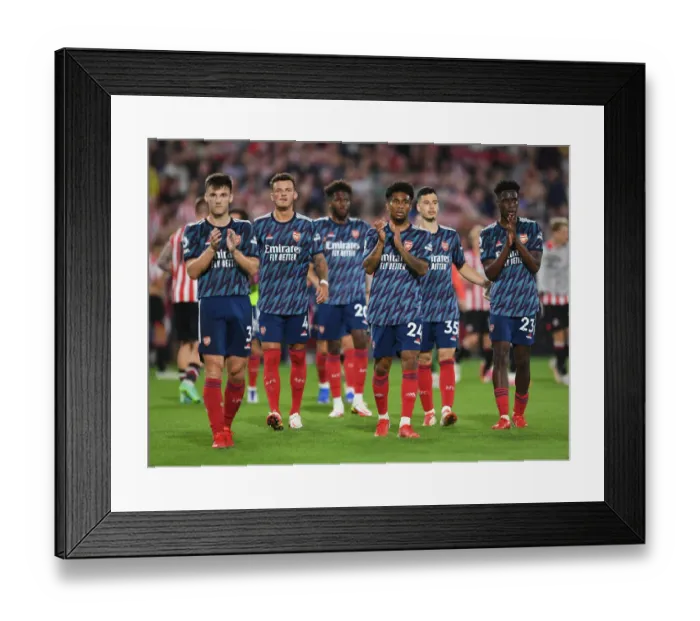 Framed Print : Arsenal's Reiss Nelson Celebrates with Fans after Brentford Victory - 2021-22 Premier League