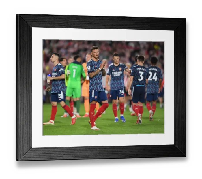 Framed Print : Arsenal's Ben White Celebrates with Fans: Brentford Victory in 2021-22 Premier League