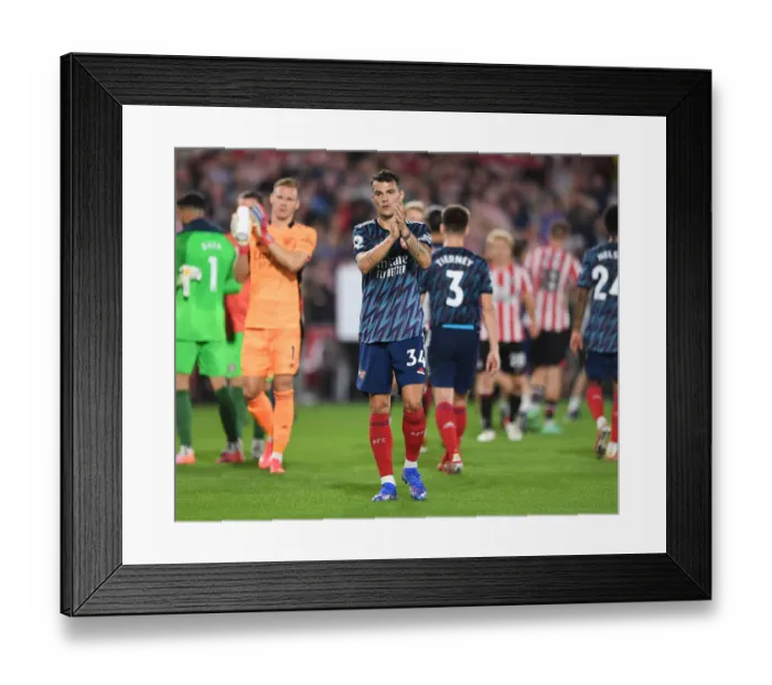 Framed Print : Granit Xhaka Celebrates with Arsenal Fans after Brentford Victory - Premier League 2021-22